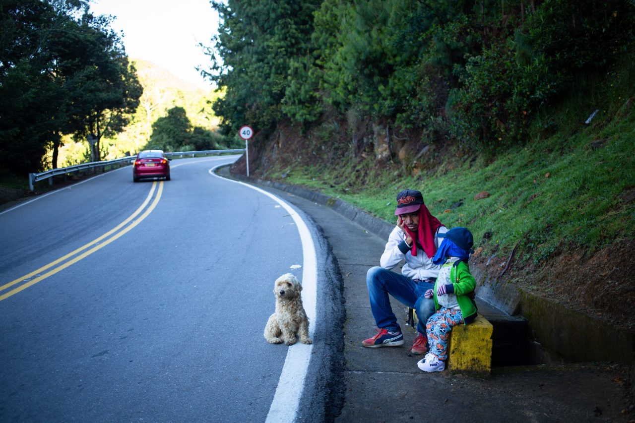 Juan, 28, and his son Santiago take a rest hoping to get a lift to take them across the paramo between Cúcuta and Bucaramanga. The highlands where temperatures drop down to 5-0 °C. Pamplona, Colombia. Nov. 12, 2018. ©Erika Piñeros



**Note: Not for commercial use. Editorial use only. No Book Sales. Mandatory credit/byline. Not for sale for marketing or advertising campaigns. Image to be distributed exactly as supplied. No archive. All rights and copyright retained by photographer. No Syndication. No third-party distribution. Photo to be used only with the original story.