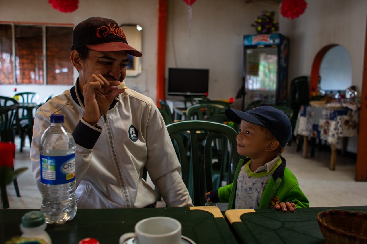 Juan feeds Santiago during their long journey to Bogota. “At least people can help us here”, says Juan. “In Venezuela, people see us walking pass, but they don’t have anything [food or clothing] to offer us”. Norte de Santander, Colombia. Nov. 12, 2018. ©Erika Piñeros



**Note: Not for commercial use. Editorial use only. No Book Sales. Mandatory credit/byline. Not for sale for marketing or advertising campaigns. Image to be distributed exactly as supplied. No archive. All rights and copyright retained by photographer. No Syndication. No third-party distribution. Photo to be used only with the original story.
